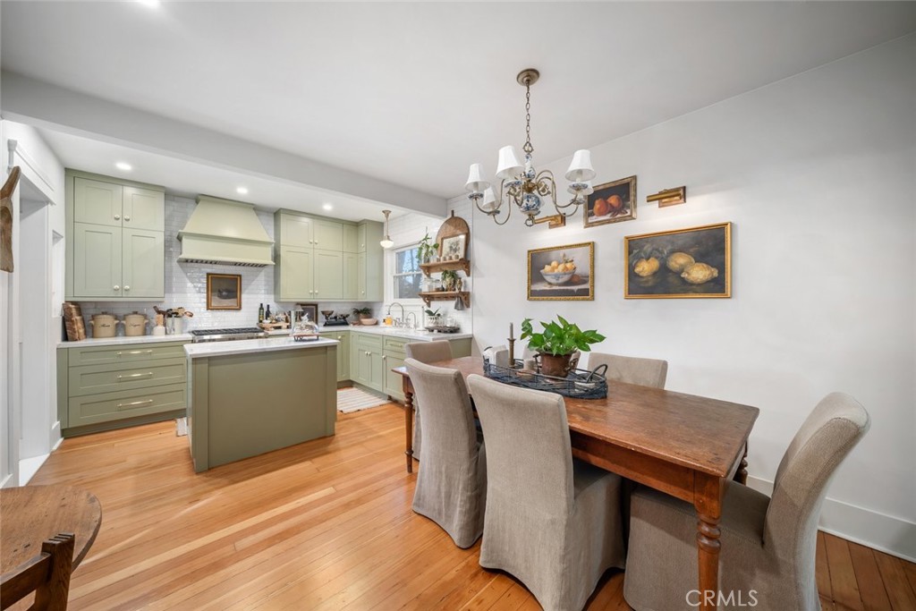 135 18th Street Paso Robles, CA 93446 - Photo 7 of 45 a dining room with kitchen island stainless steel appliances furniture a chandelier and kitchen view