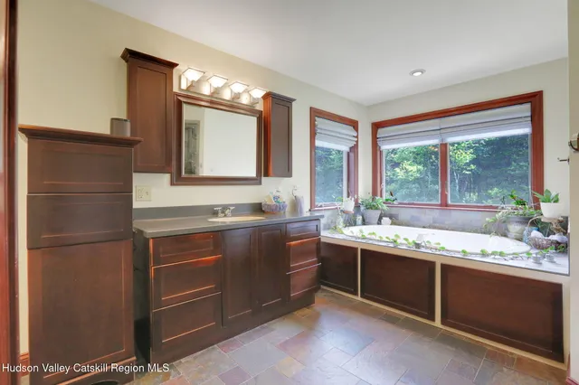 a kitchen with a sink and a stove