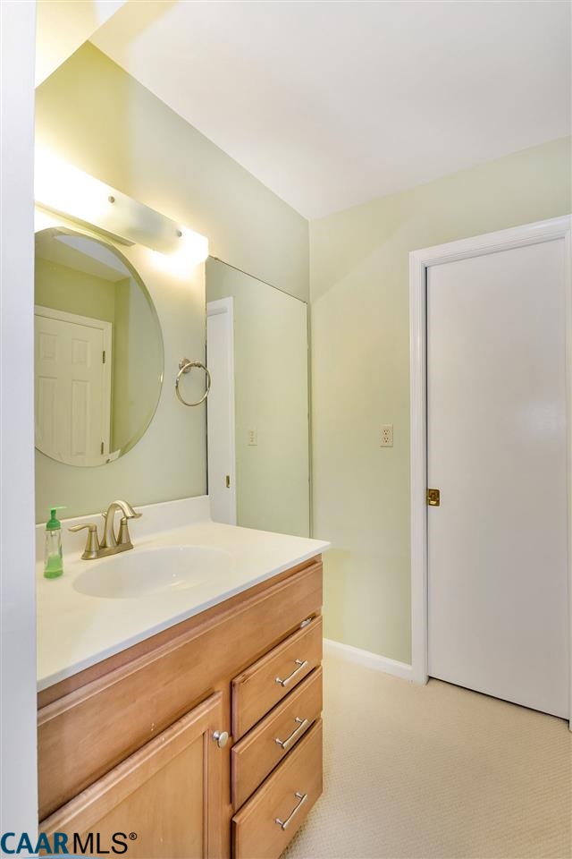 806 Harris Road Charlottesville, VA 22902 - Photo 15 of 20 a bathroom with a sink and a mirror