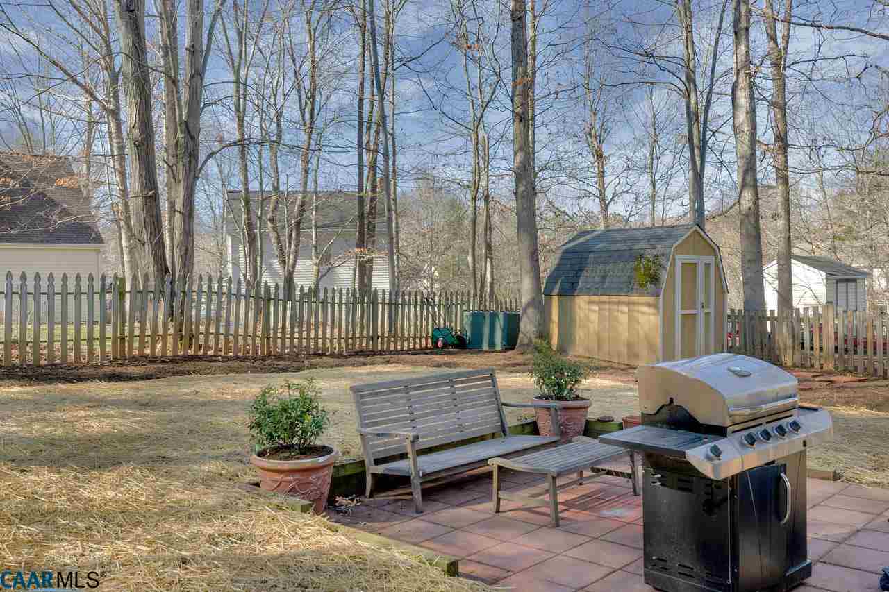 806 Harris Road Charlottesville, VA 22902 - Photo 2 of 20 a view of backyard with a table and chairs