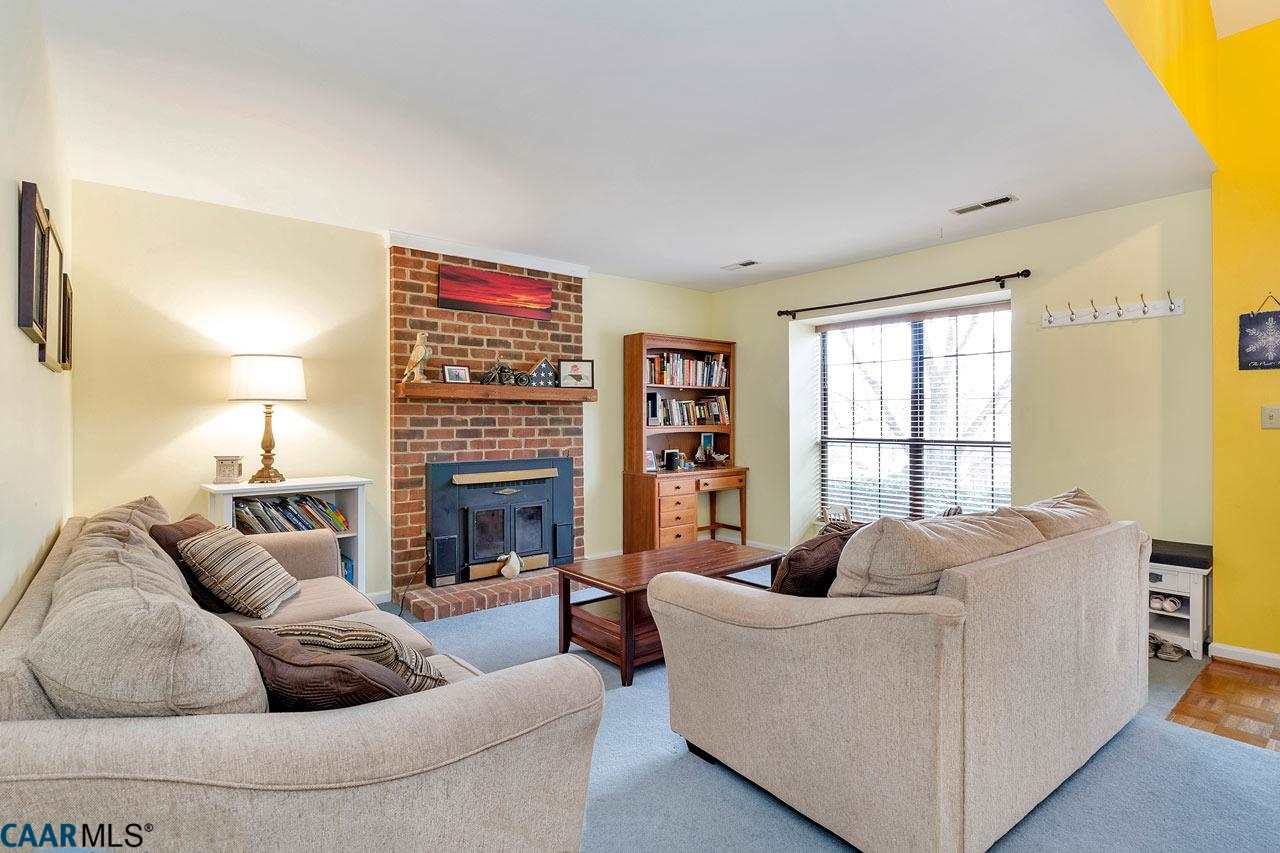 806 Harris Road Charlottesville, VA 22902 - Photo 4 of 20 a living room with furniture and a fireplace