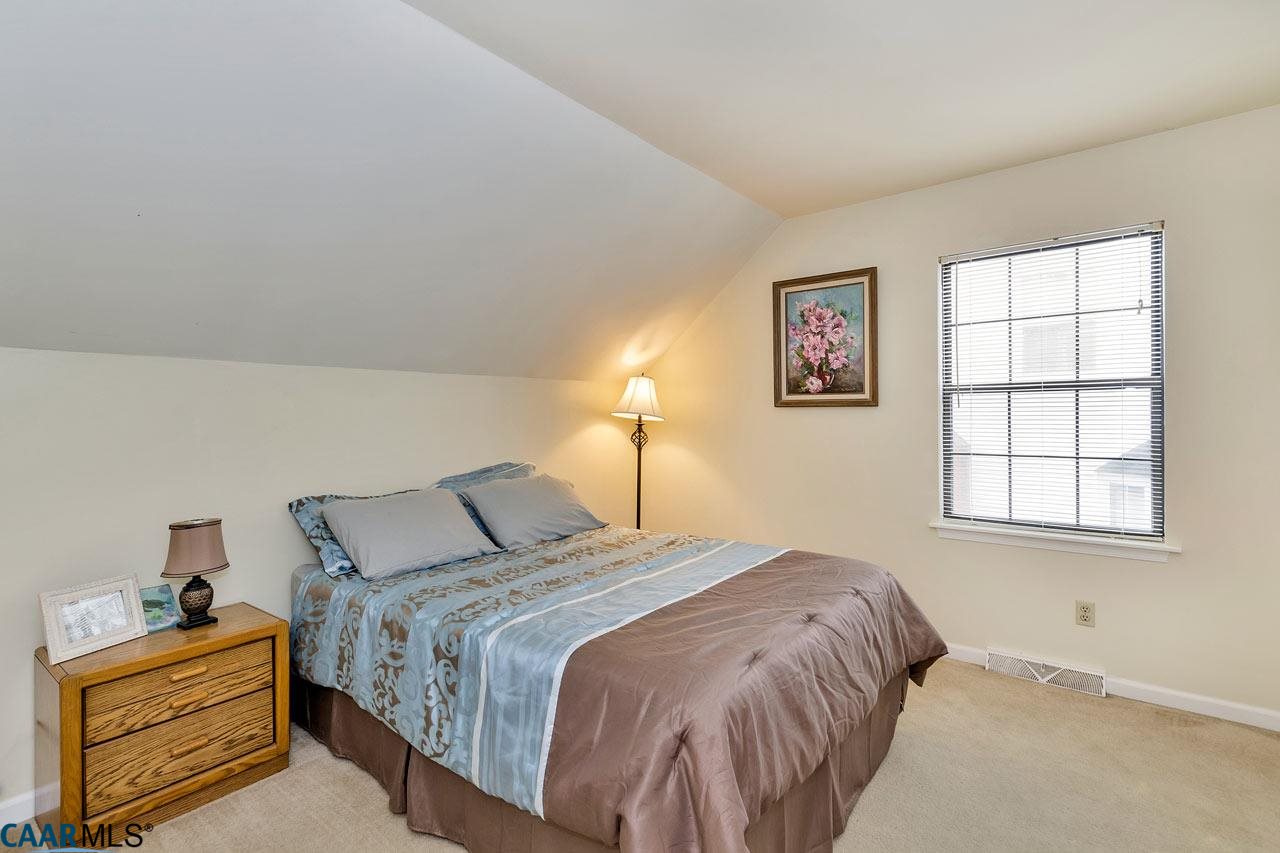 806 Harris Road Charlottesville, VA 22902 - Photo 8 of 20 a bedroom with a bed and a window
