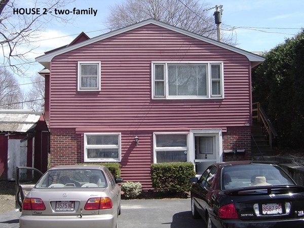 8 Rosemont Road Worcester, MA 01605 - Photo 6 of 30 a front view of a house with parking space