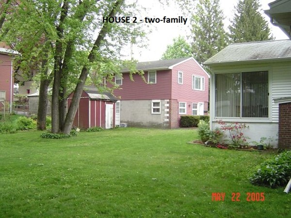 8 Rosemont Road Worcester, MA 01605 - Photo 7 of 30 a front view of a house with a garden