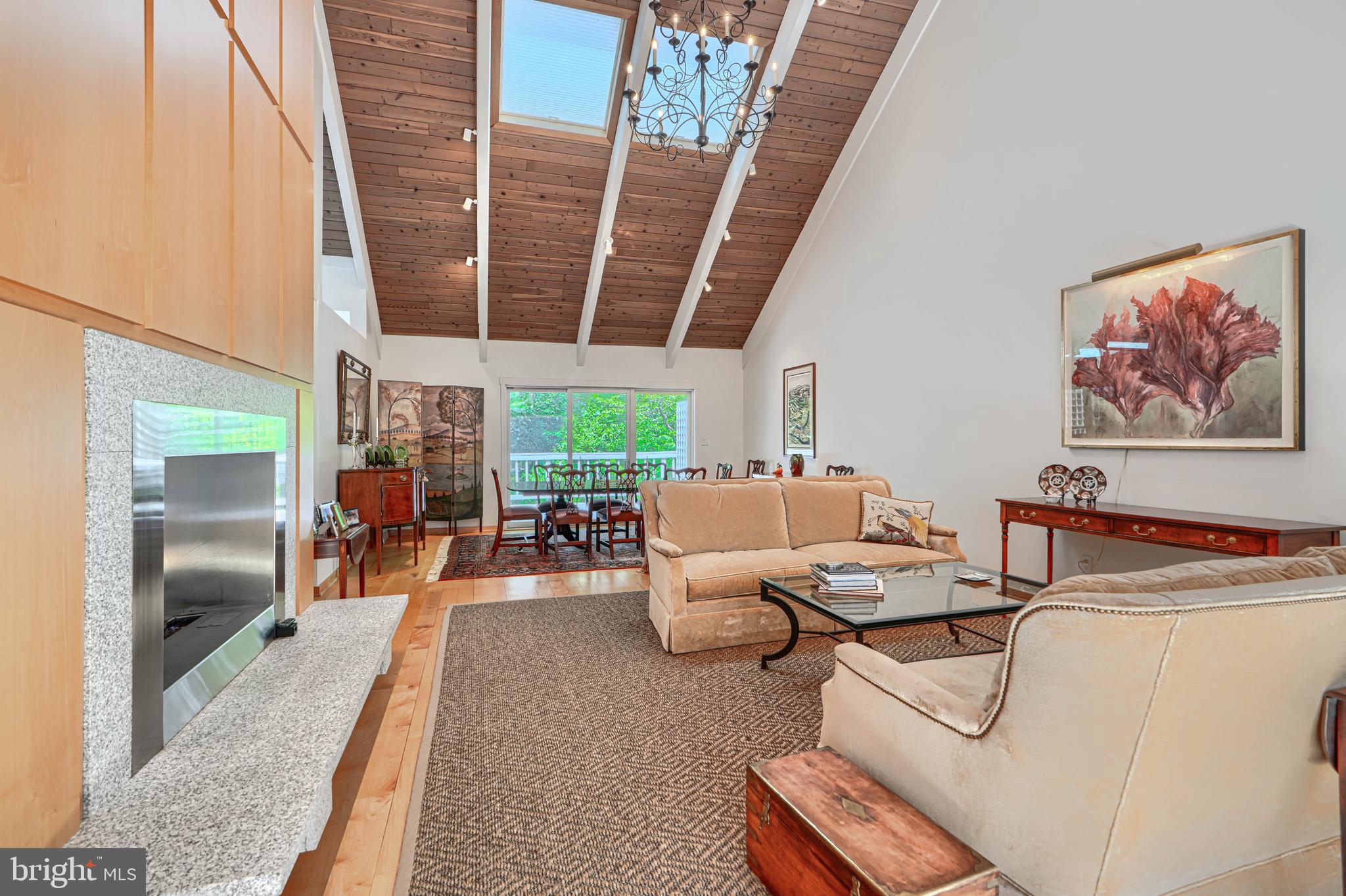 2504 Stone Mill Road Baltimore, MD 21208 - Photo 24 of 123 Wood flooring on main level, skylights
