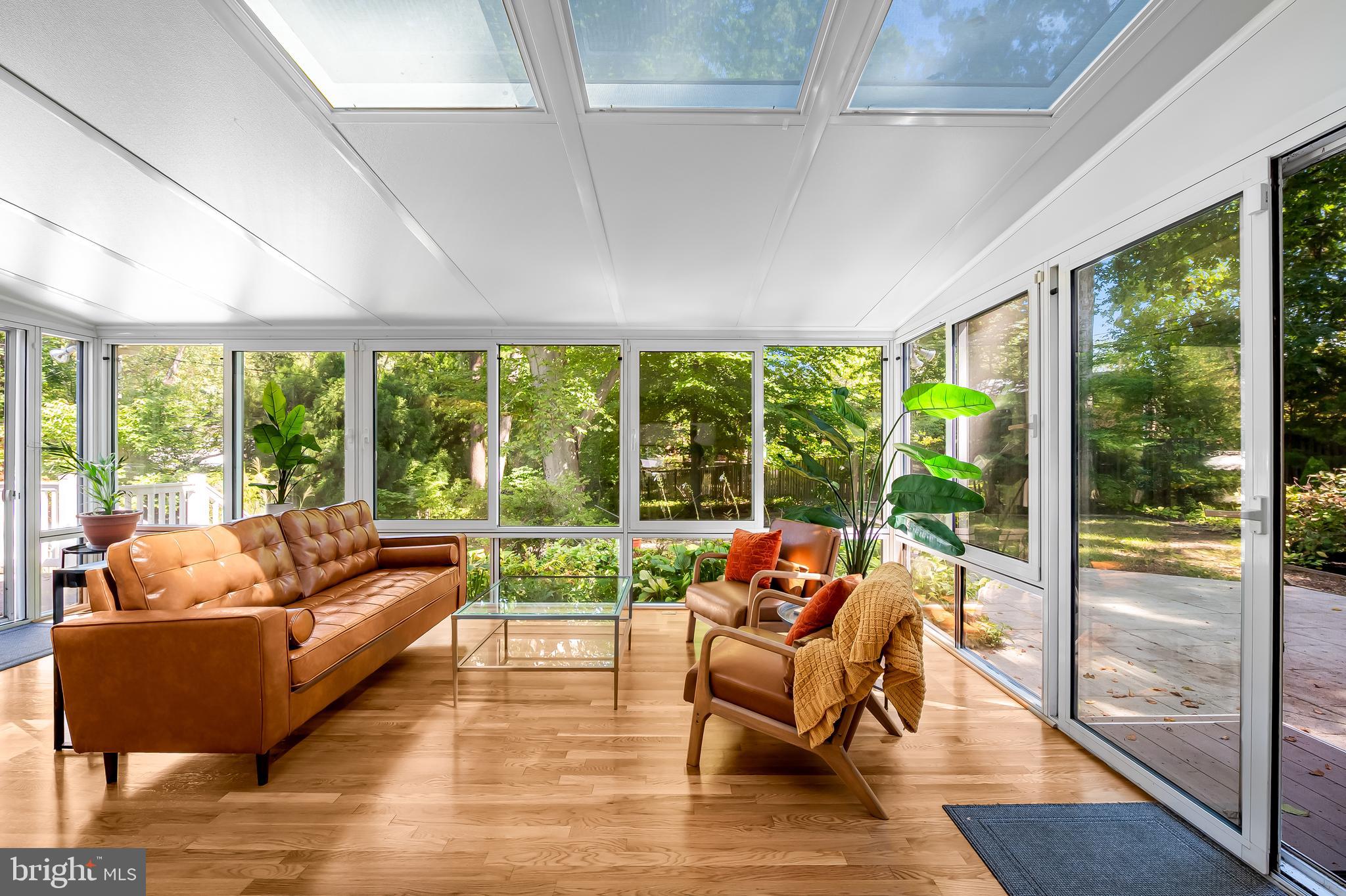 6103 Ivydene Terrace Baltimore, MD 21209 - Photo 21 of 51 a living room with furniture and a yard