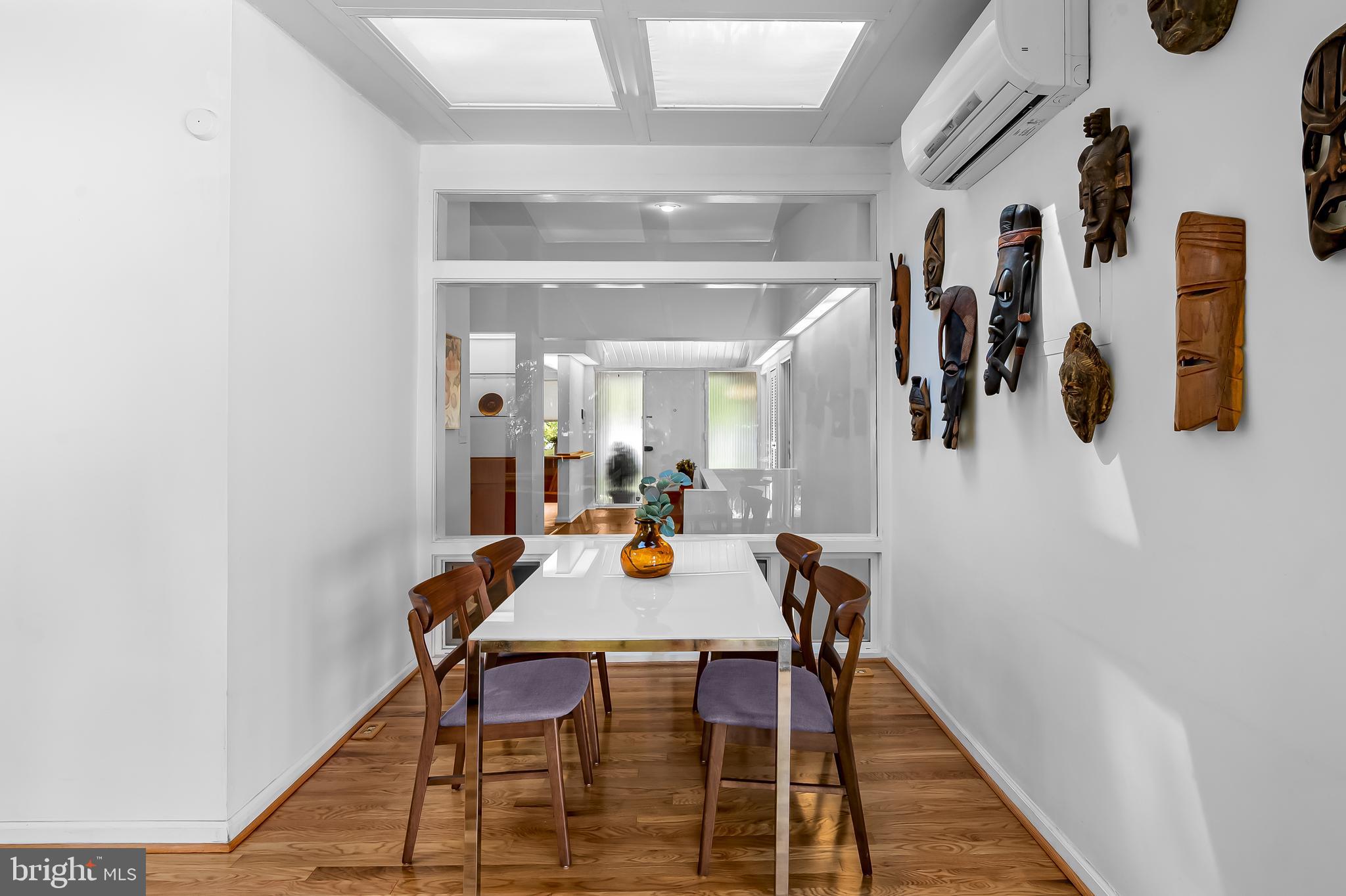 6103 Ivydene Terrace Baltimore, MD 21209 - Photo 24 of 51 a view of a dining room with furniture and wooden floor