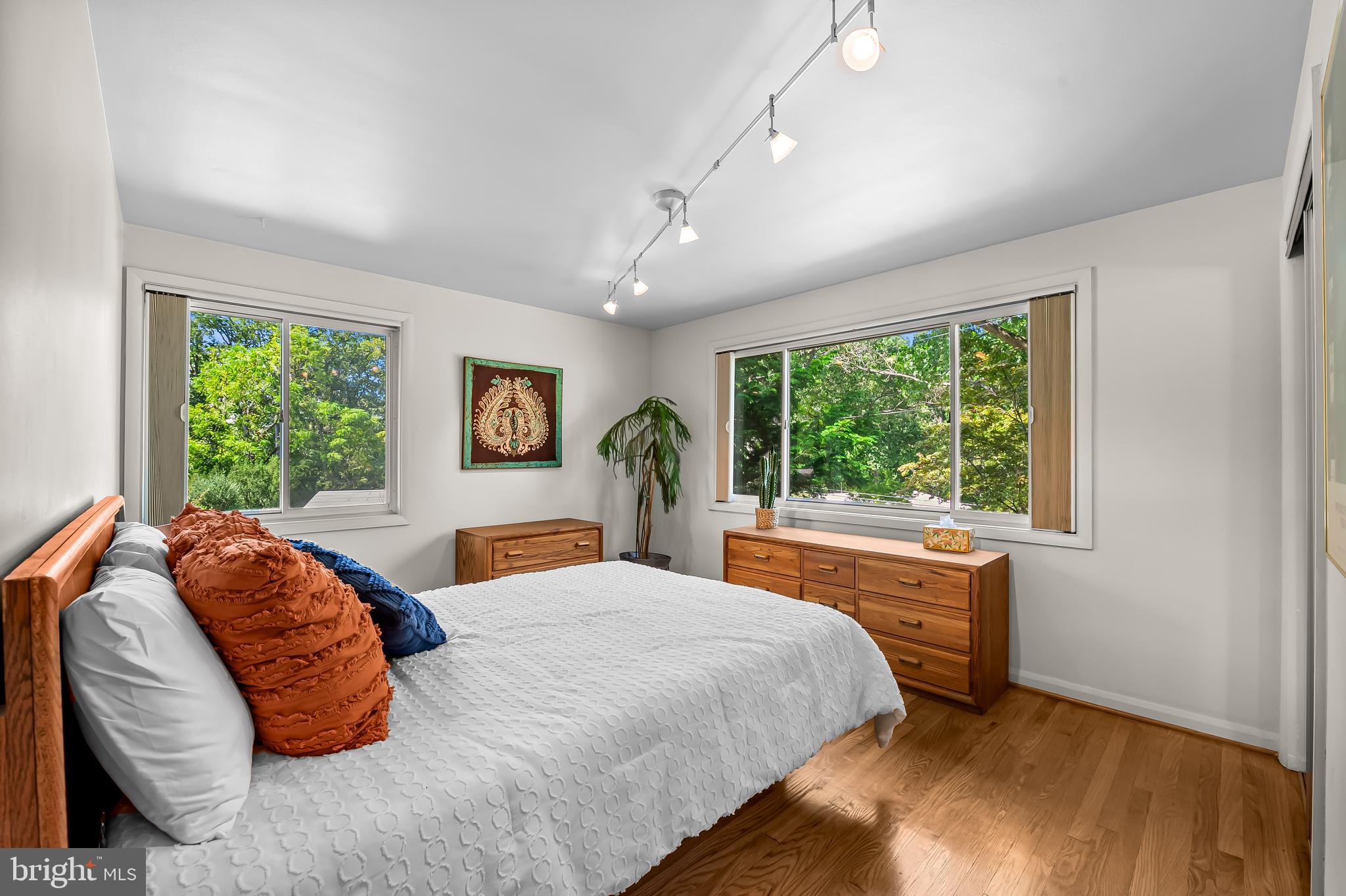 6103 Ivydene Terrace Baltimore, MD 21209 - Photo 27 of 51 a bedroom with a bed and a large window