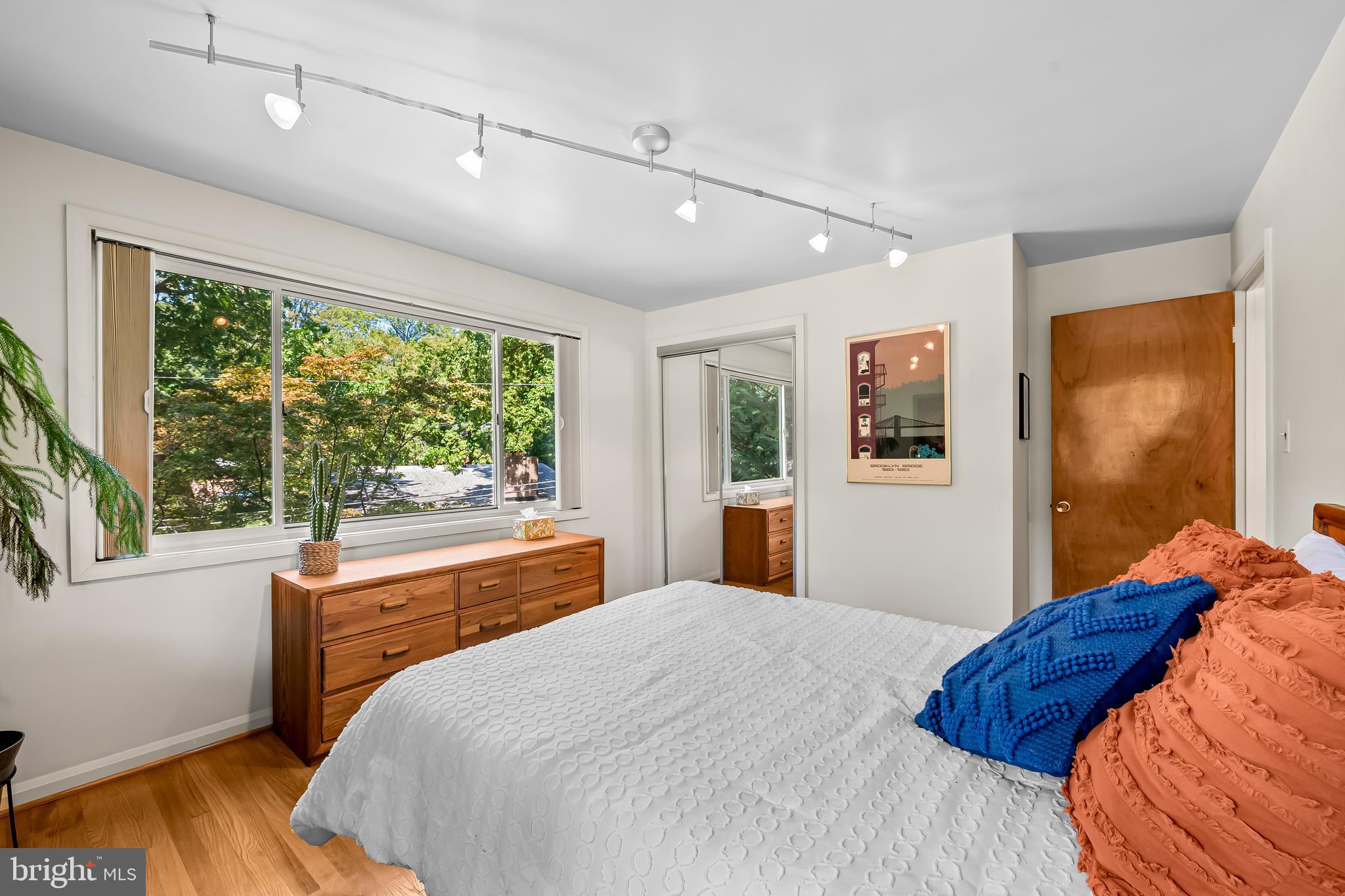 6103 Ivydene Terrace Baltimore, MD 21209 - Photo 28 of 51 a bedroom with a large bed and a large window