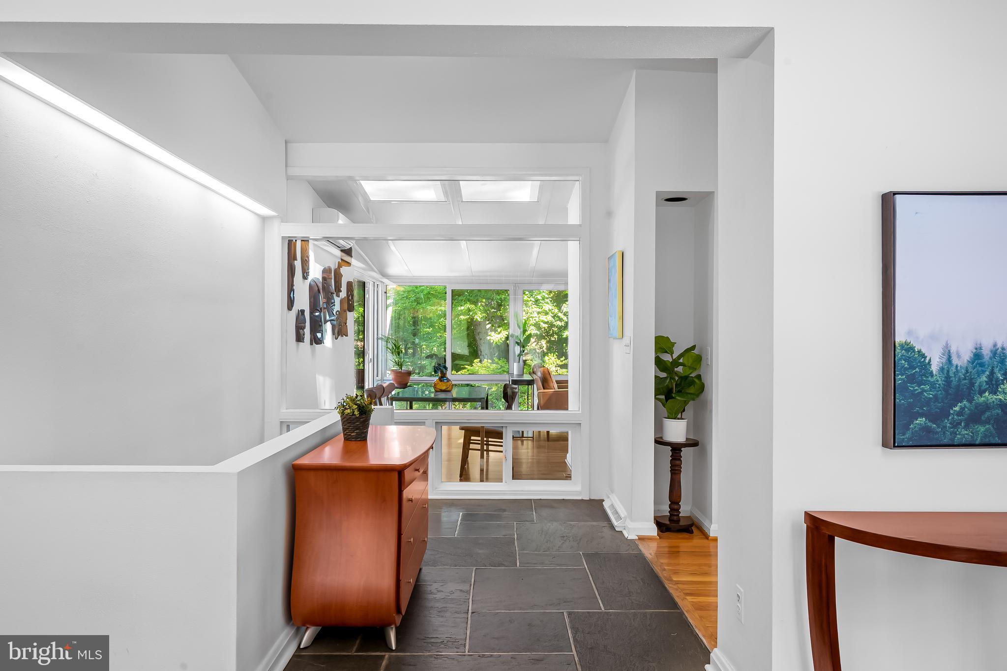 6103 Ivydene Terrace Baltimore, MD 21209 - Photo 3 of 51 a room with furniture and a potted plant