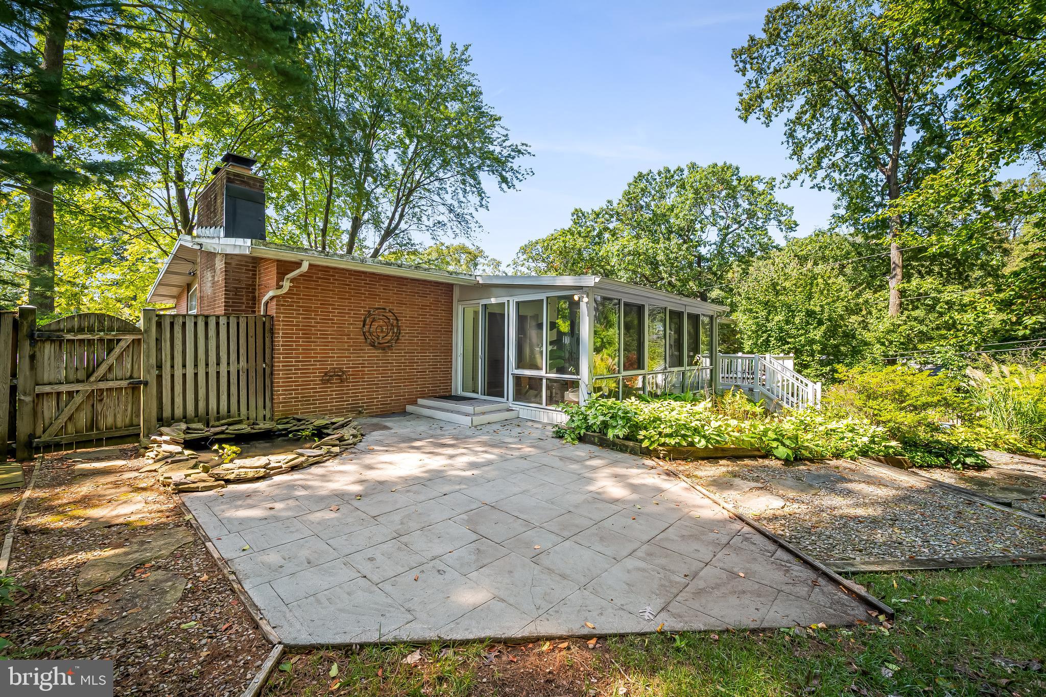 6103 Ivydene Terrace Baltimore, MD 21209 - Photo 45 of 51 front view of a house with a yard