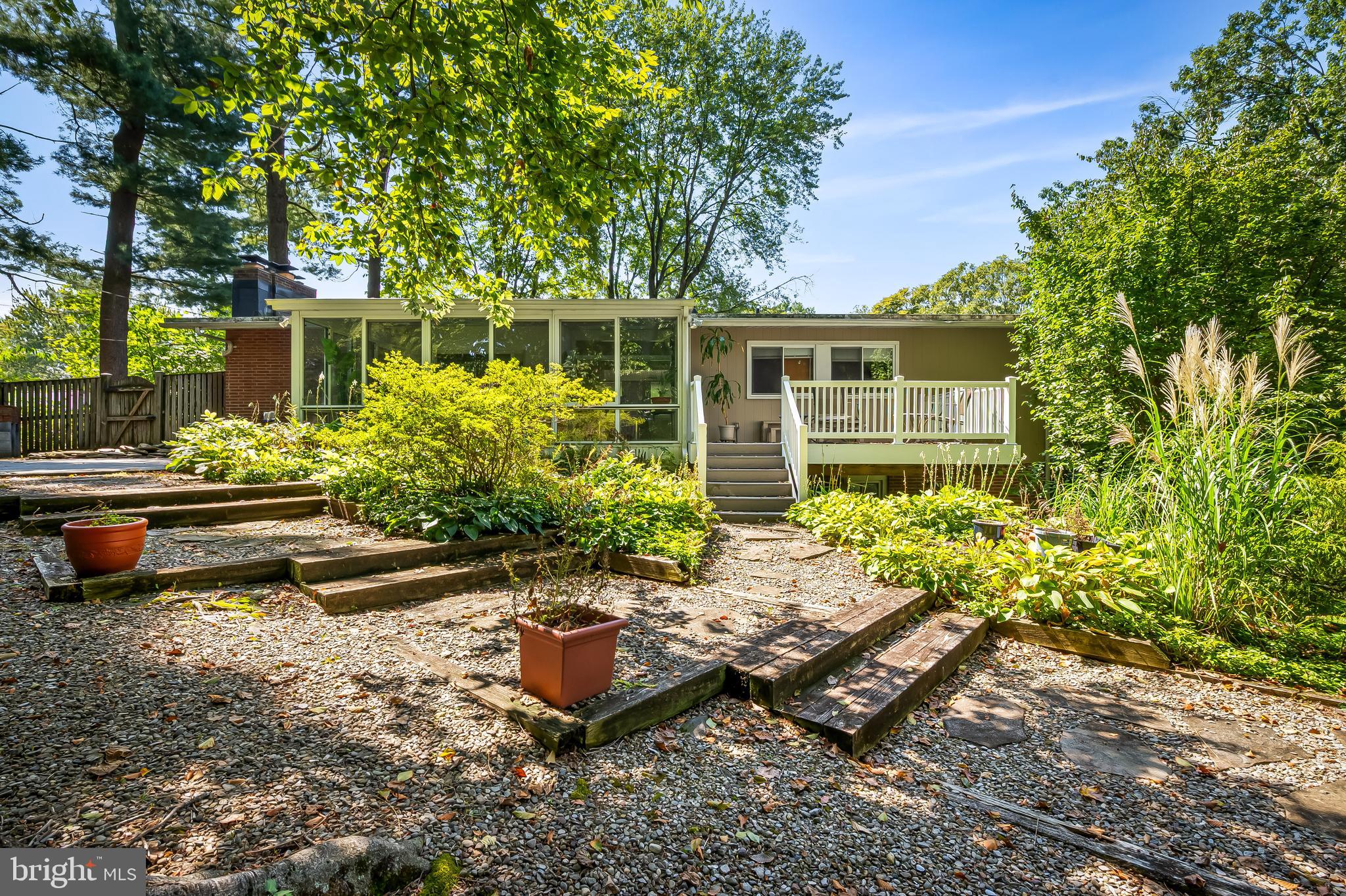 6103 Ivydene Terrace Baltimore, MD 21209 - Photo 47 of 51 a view of a backyard with chairs and plants