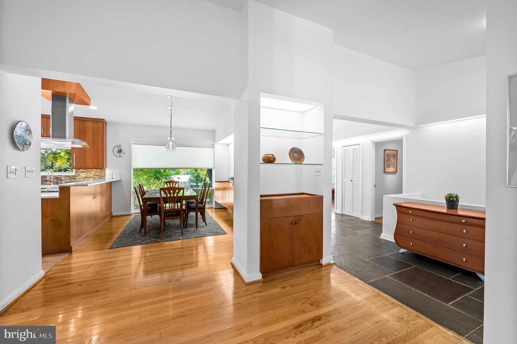 6103 Ivydene Terrace Baltimore, MD 21209 - Photo 5 of 51 a living room with furniture and wooden floor