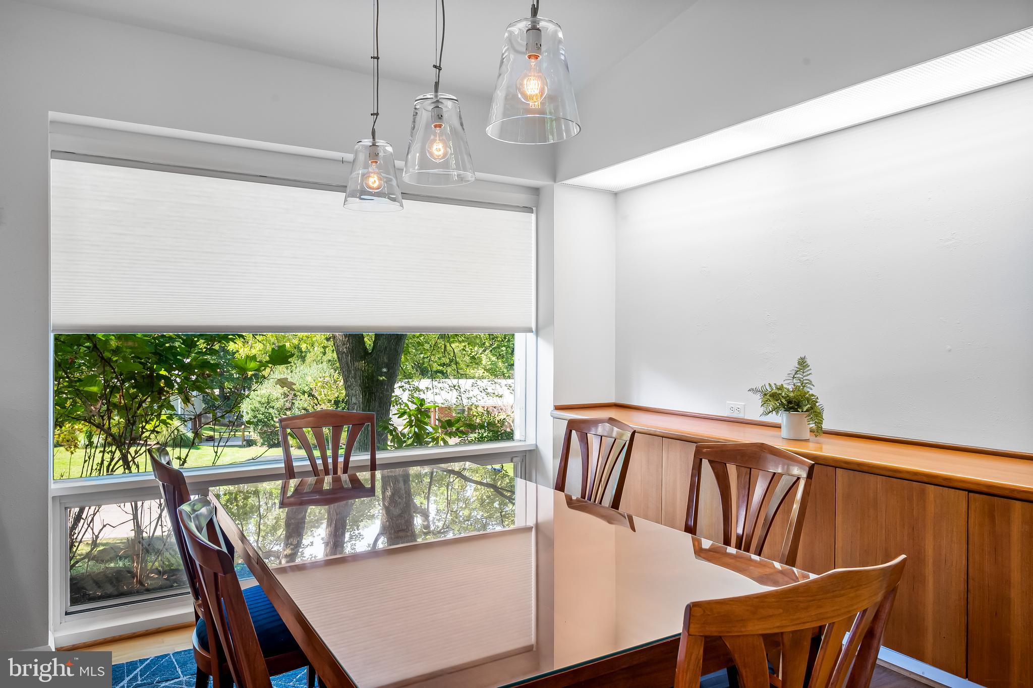 6103 Ivydene Terrace Baltimore, MD 21209 - Photo 9 of 51 a view of a dining room with furniture window and outside view