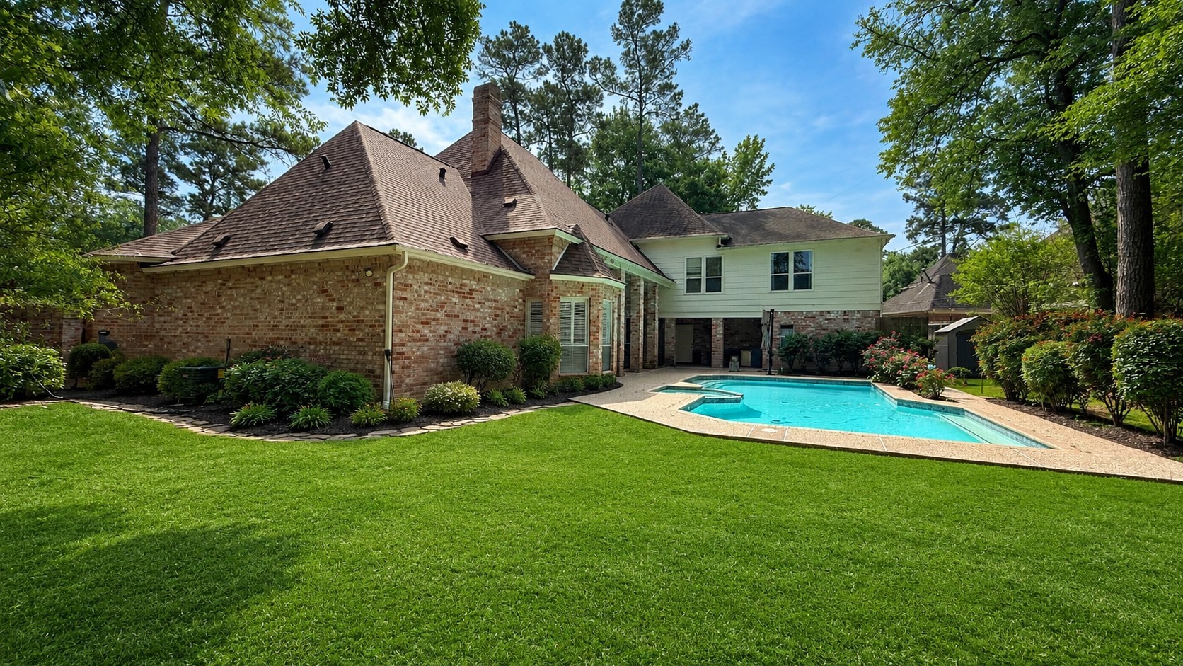 15923 Harwick Drive Spring, TX 77379 - Photo 15 of 16 This yard is very large and has wonderful mature trees that provide a lot of shade.