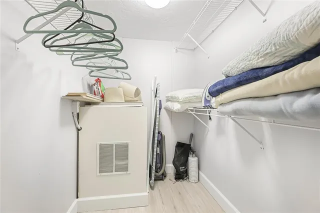 a view of a room with racks on the wall