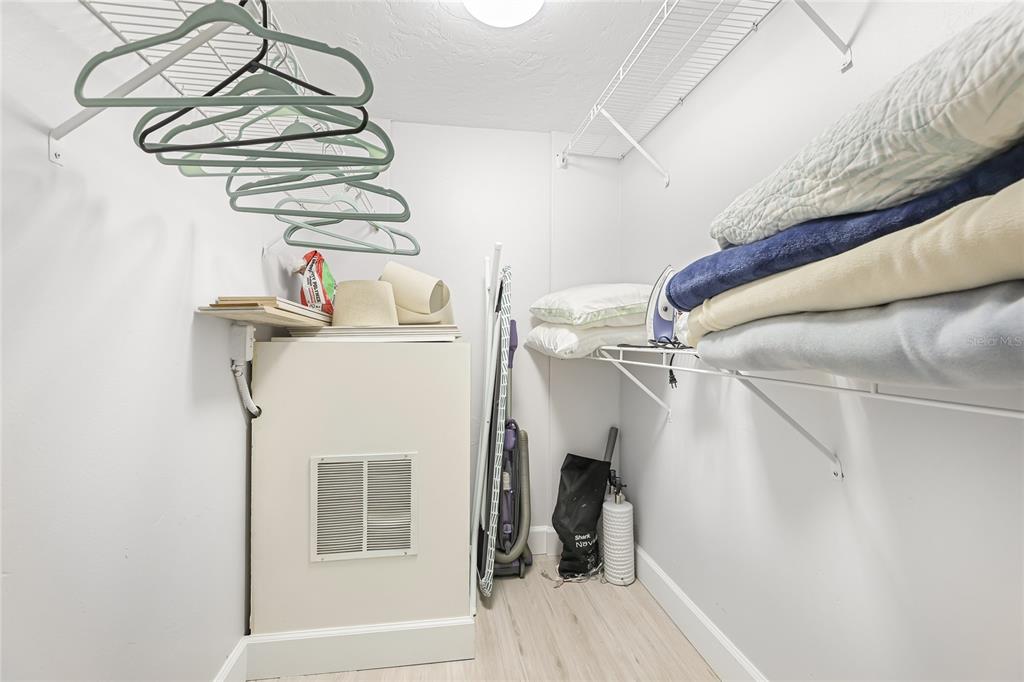 625 Beach Road, Unit 407 Sarasota, FL 34242 - Photo 22 of 43 a view of a room with racks on the wall