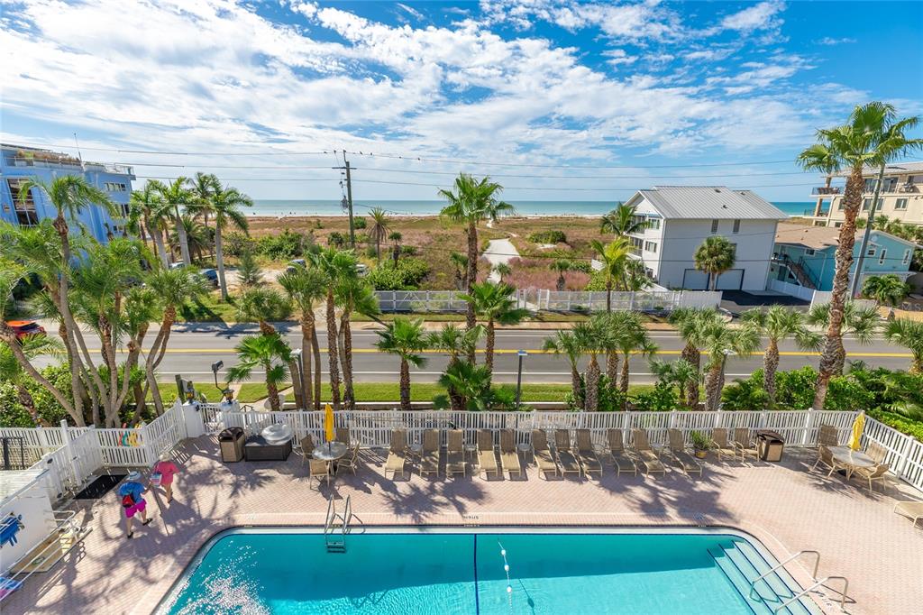 625 Beach Road, Unit 407 Sarasota, FL 34242 - Photo 32 of 43 a view of a swimming pool with a patio