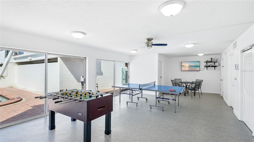 625 Beach Road, Unit 407 Sarasota, FL 34242 - Photo 40 of 43 a room with furniture and a table