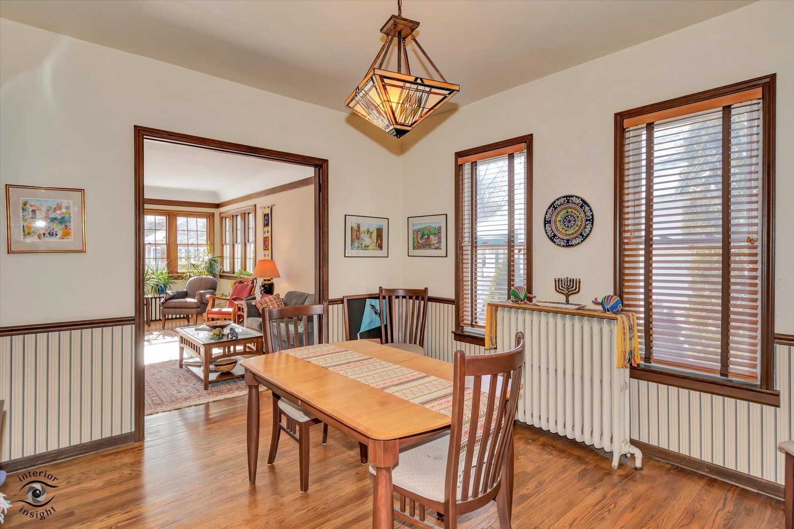 1650 West 105th Street Chicago, IL 60643 - Photo 13 of 43 a view of a dining room and livingroom with furniture wooden floor a chandelier