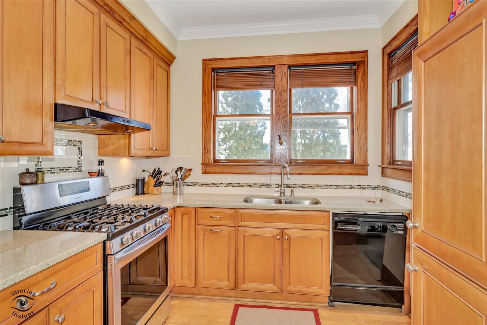 1650 West 105th Street Chicago, IL 60643 - Photo 14 of 43 a kitchen with stainless steel appliances granite countertop a sink stove and cabinets
