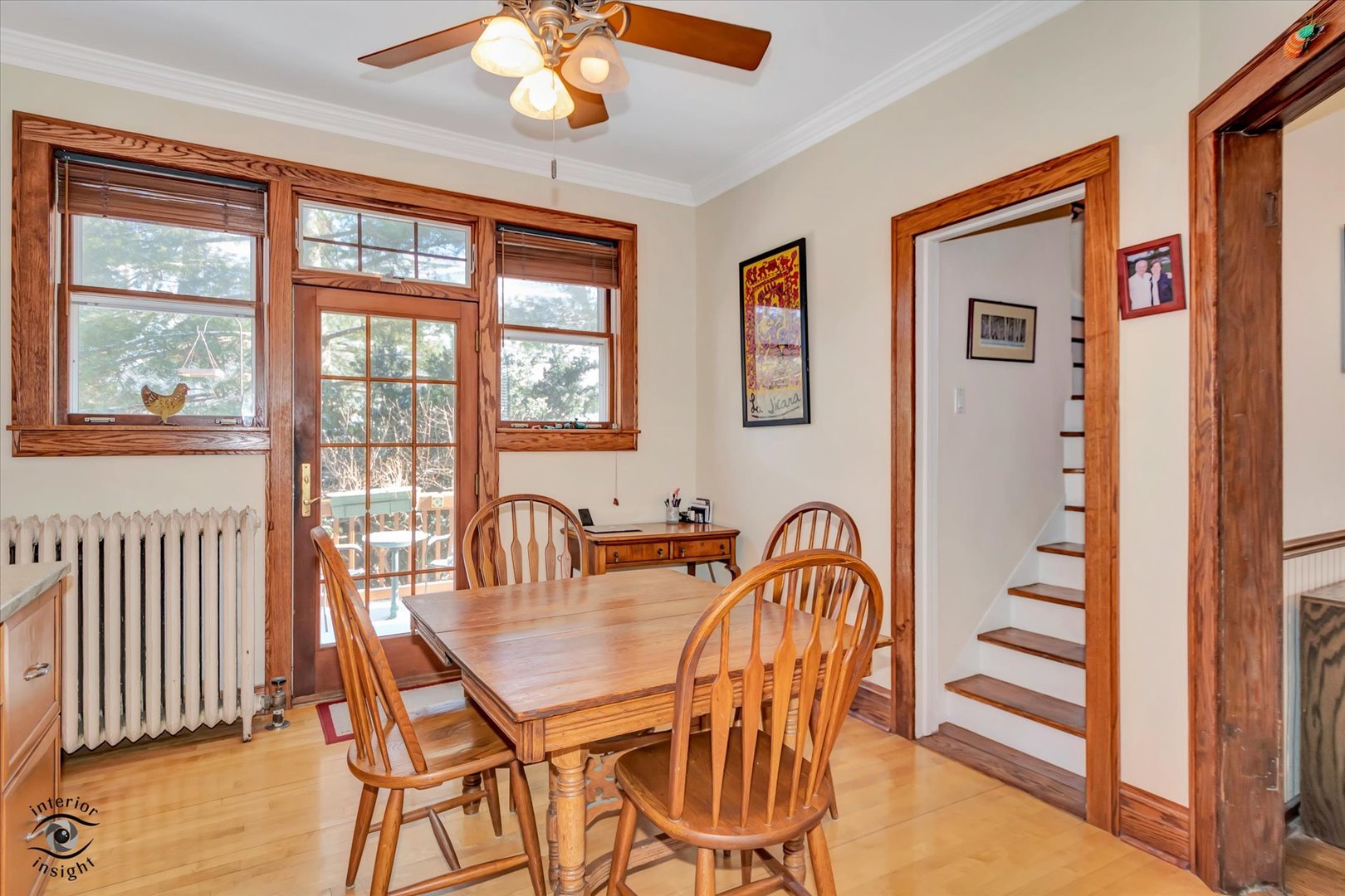 1650 West 105th Street Chicago, IL 60643 - Photo 17 of 43 a dining room with furniture a chandelier and wooden floor