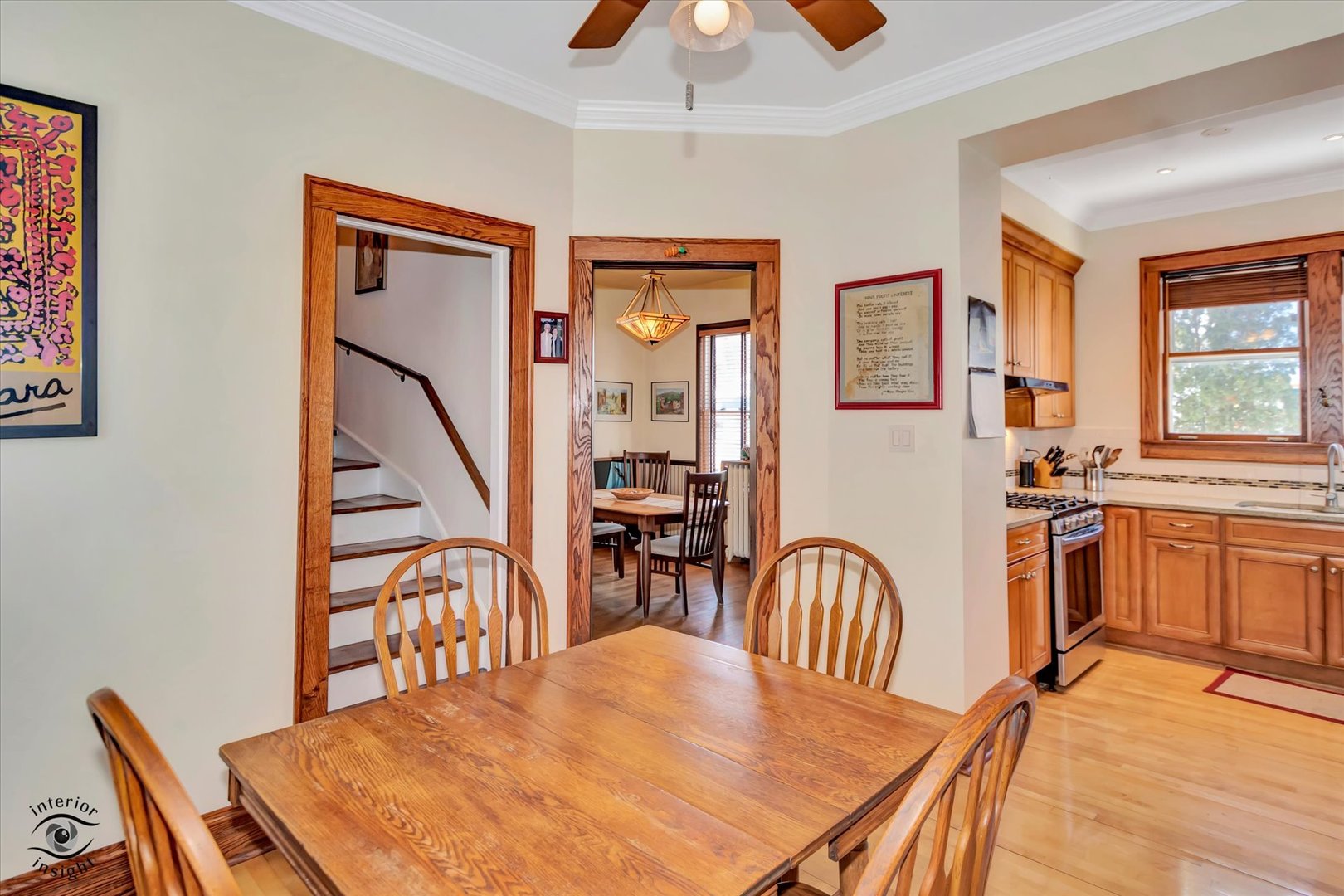 1650 West 105th Street Chicago, IL 60643 - Photo 19 of 43 a dining room with furniture a chandelier and wooden floor