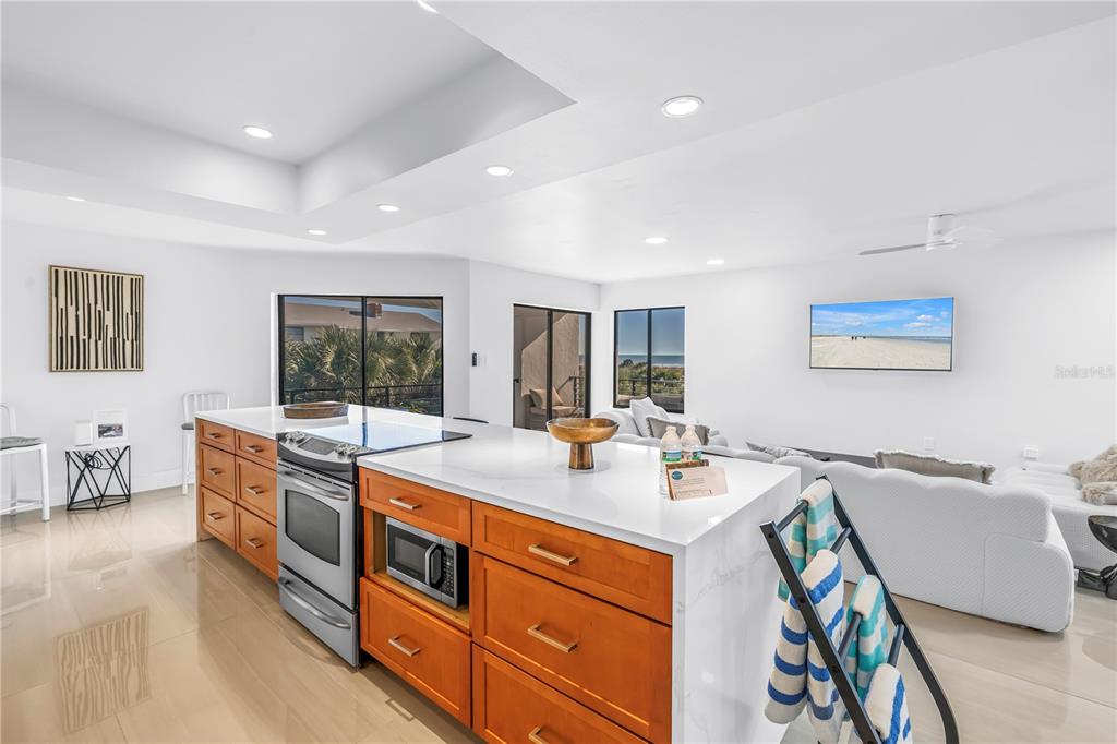450 Beach Road, Unit 4 Sarasota, FL 34242 - Photo 15 of 64 a large white kitchen with a large window