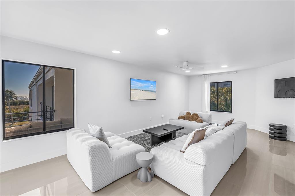 450 Beach Road, Unit 4 Sarasota, FL 34242 - Photo 22 of 64 a living room with furniture and a couch