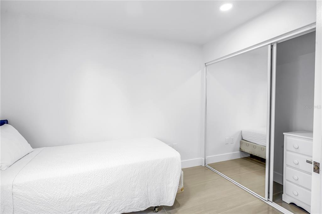 450 Beach Road, Unit 4 Sarasota, FL 34242 - Photo 35 of 64 a bathroom with a toilet and a shower