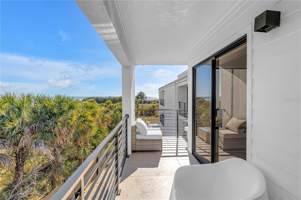 450 Beach Road, Unit 4 Sarasota, FL 34242 - Photo 39 of 64 a balcony view with a couch