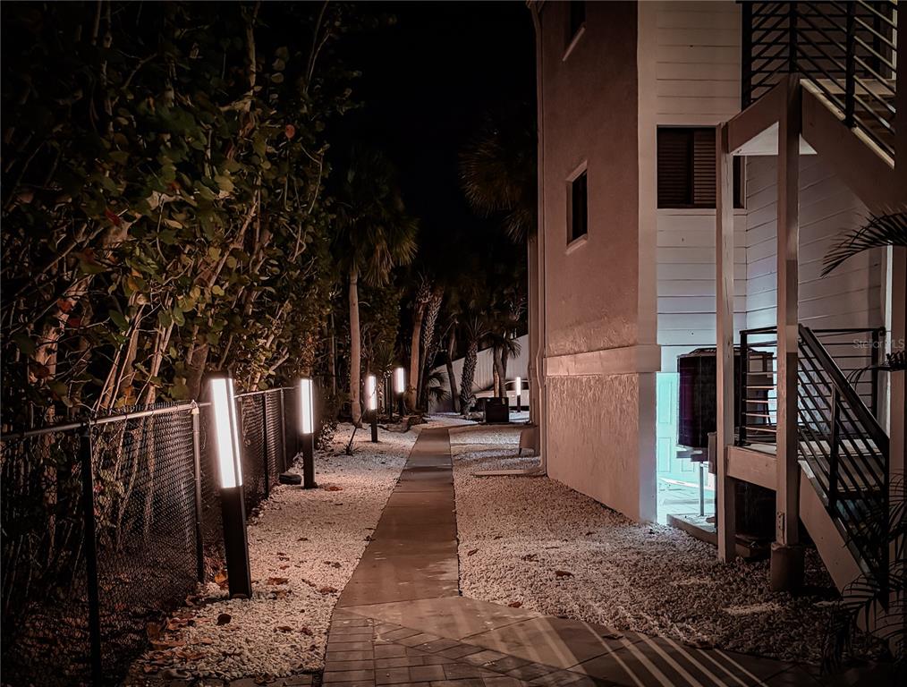 450 Beach Road, Unit 4 Sarasota, FL 34242 - Photo 60 of 64 a view of road with large trees