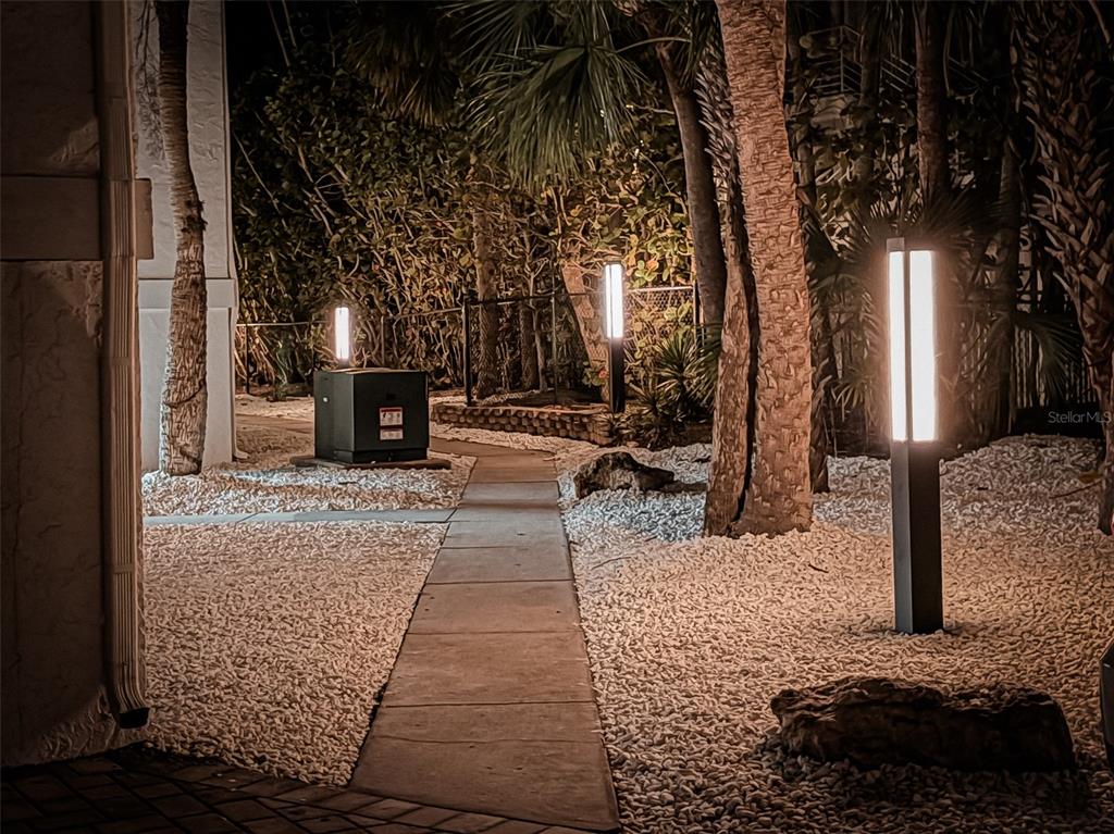 450 Beach Road, Unit 4 Sarasota, FL 34242 - Photo 61 of 64 a view of a backyard of the house