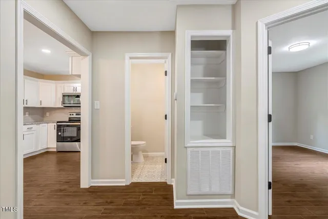a view of a kitchen from the hallway