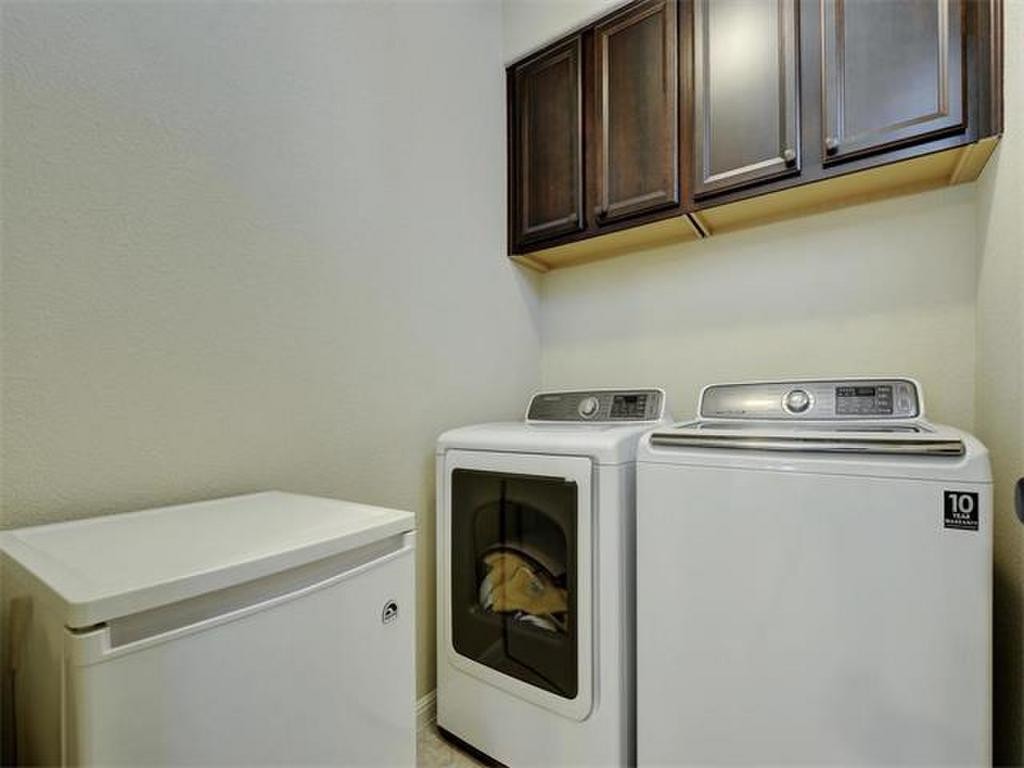 14001 Avery Ranch Boulevard, Unit 401 Austin, TX 78717 - Photo 17 of 29 a utility room with dryer and washer