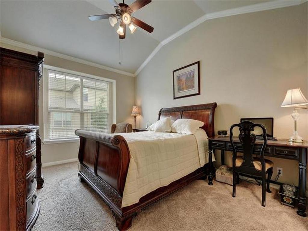 14001 Avery Ranch Boulevard, Unit 401 Austin, TX 78717 - Photo 24 of 29 a bedroom with a bed and a window