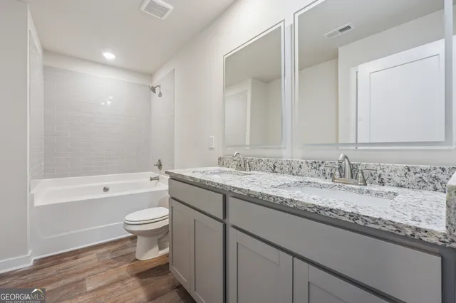 a view of storage and utility room with empty racks