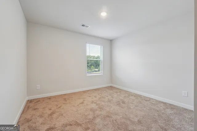 an empty room with an entryway