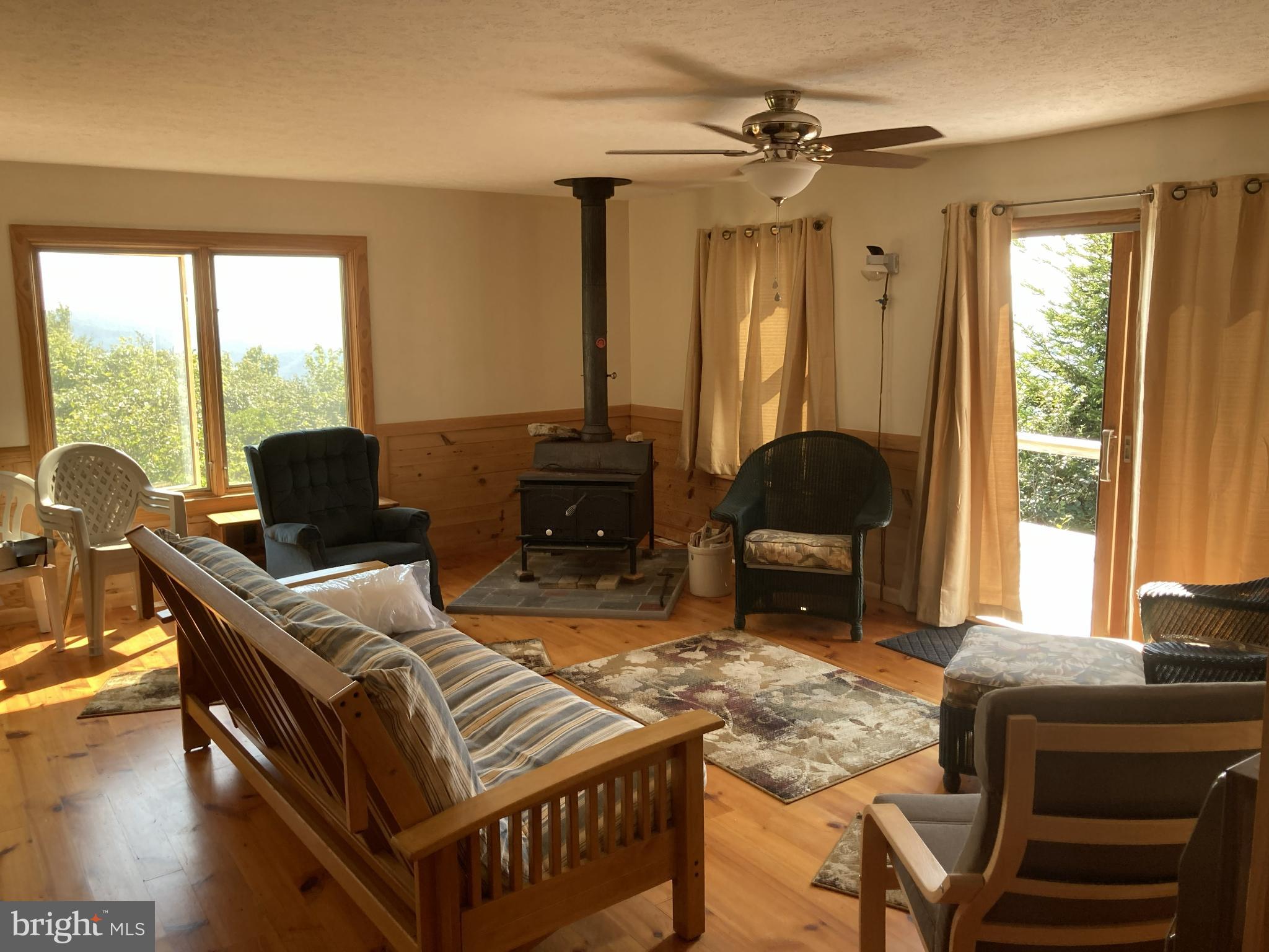 46 Pond Road Franklin, WV 26807 - Photo 10 of 28 a living room with furniture and a flat screen tv