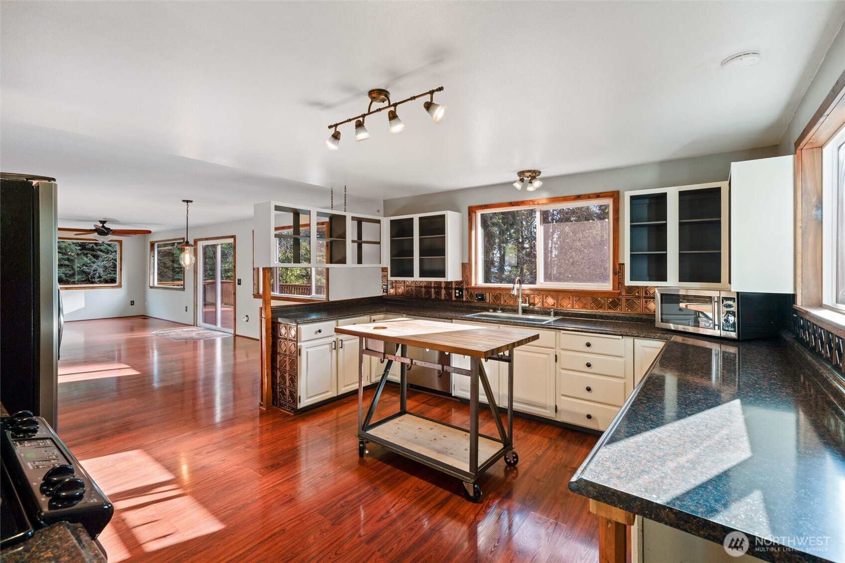 155 Blueberry Hill Road Port Ludlow, WA 98365 - Photo 13 of 39 a living room with furniture pool table and wooden floor