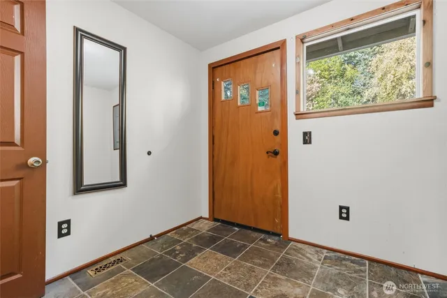 an empty room with window