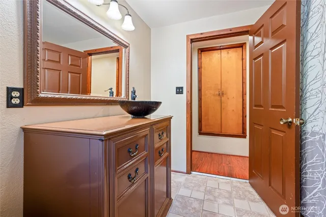 a utility room with a sink a washer and dryer