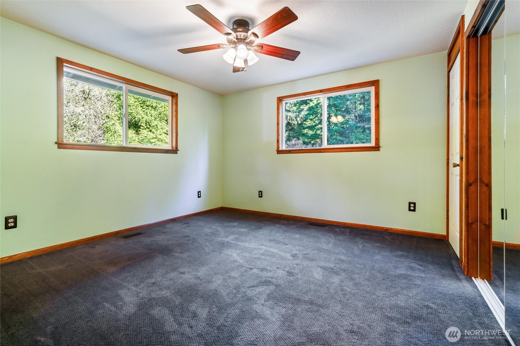 155 Blueberry Hill Road Port Ludlow, WA 98365 - Photo 23 of 39 an empty room with window and a ceiling fan