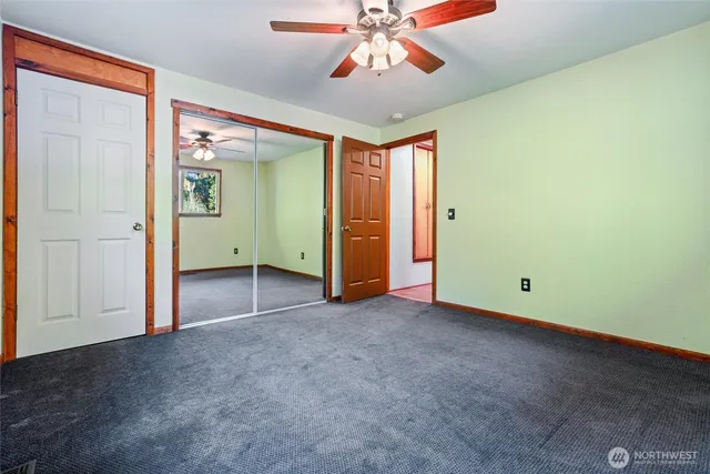 a view of a water heater room with a garage