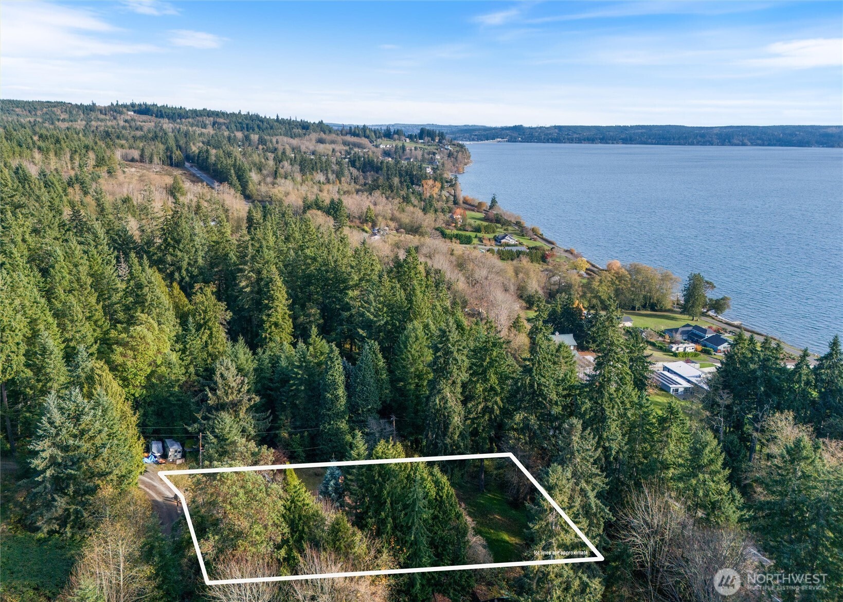 155 Blueberry Hill Road Port Ludlow, WA 98365 - Photo 37 of 39 a view of a balcony with an outdoor seating