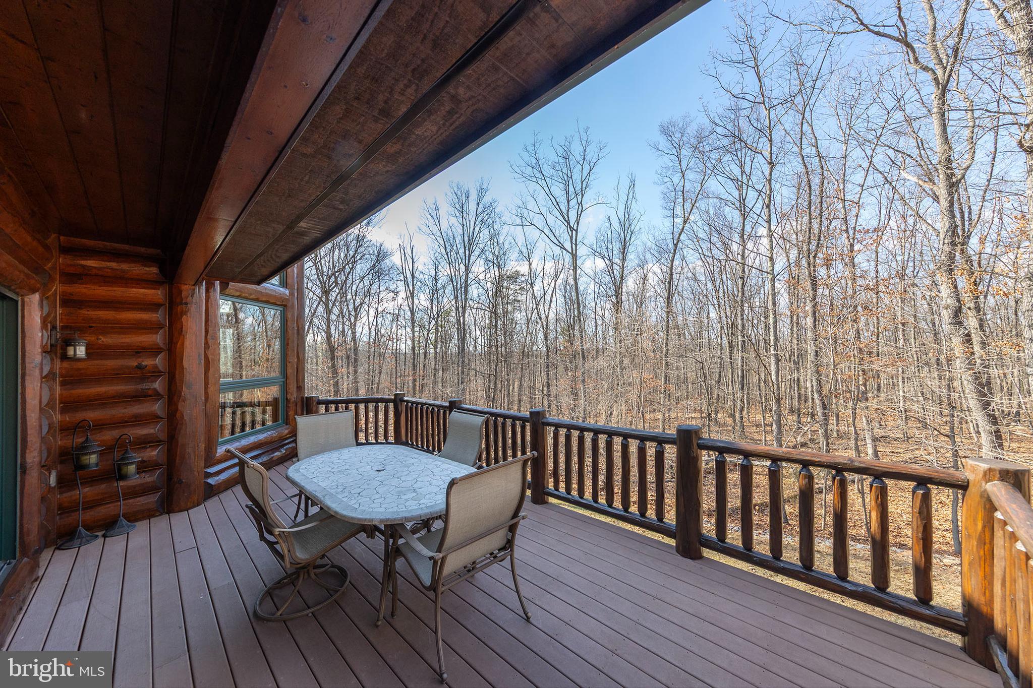 181 Signal Ridge Lane Winchester, VA 22603 - Photo 13 of 70 a view of balcony with wooden floor and outdoor seating