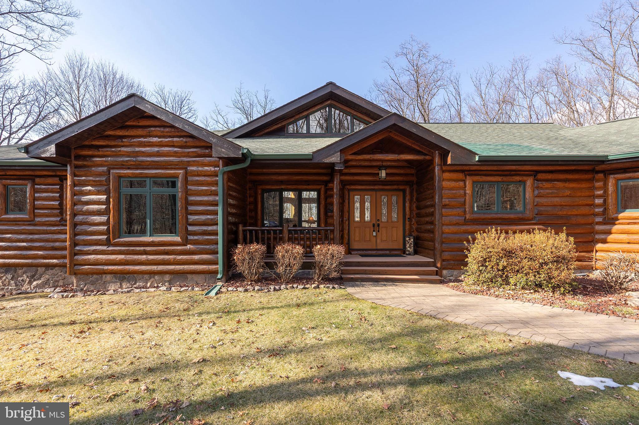 181 Signal Ridge Lane Winchester, VA 22603 - Photo 14 of 70 a front view of a house with a yard in back