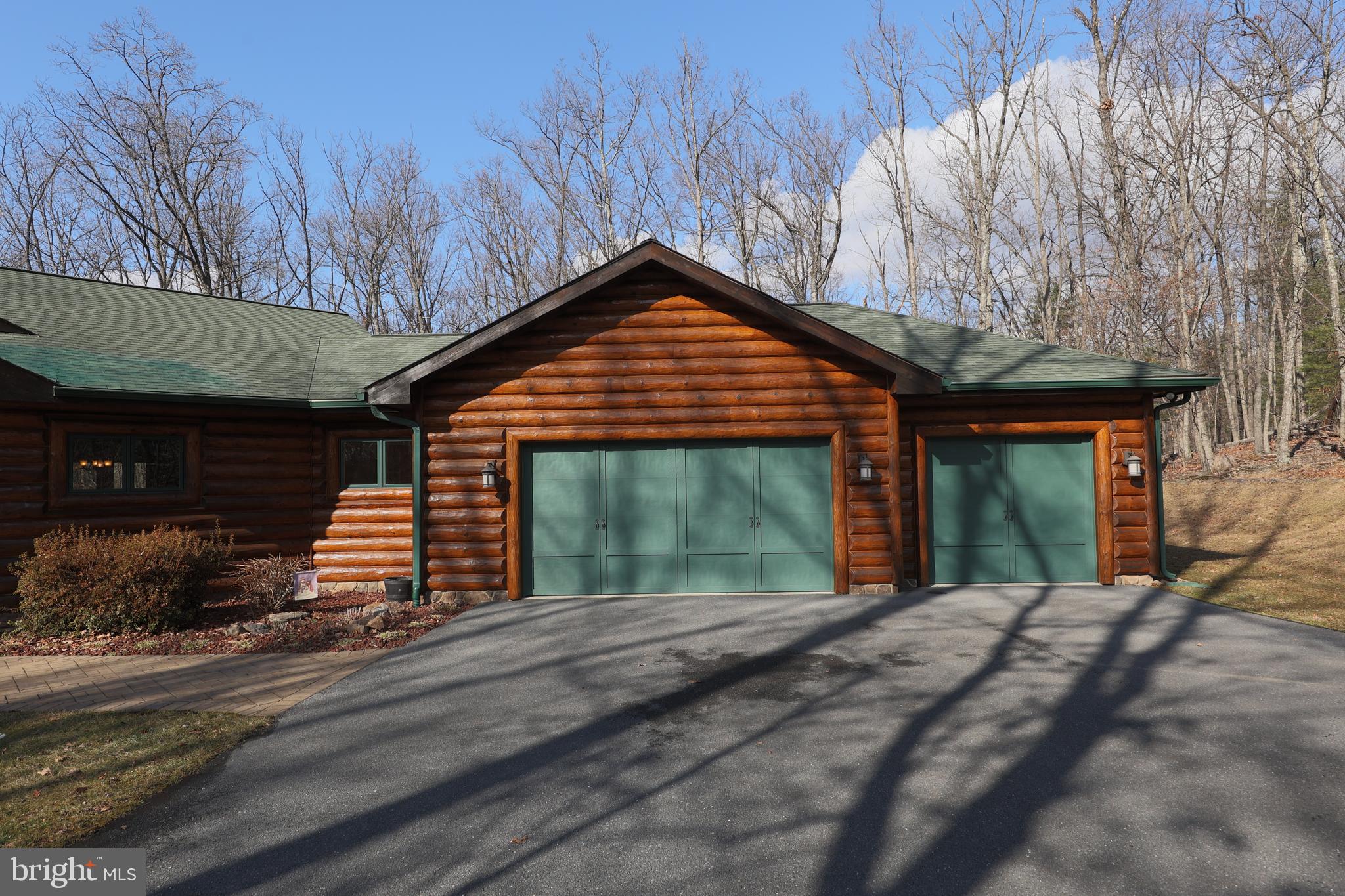 181 Signal Ridge Lane Winchester, VA 22603 - Photo 17 of 70 a front view of a house with a garden