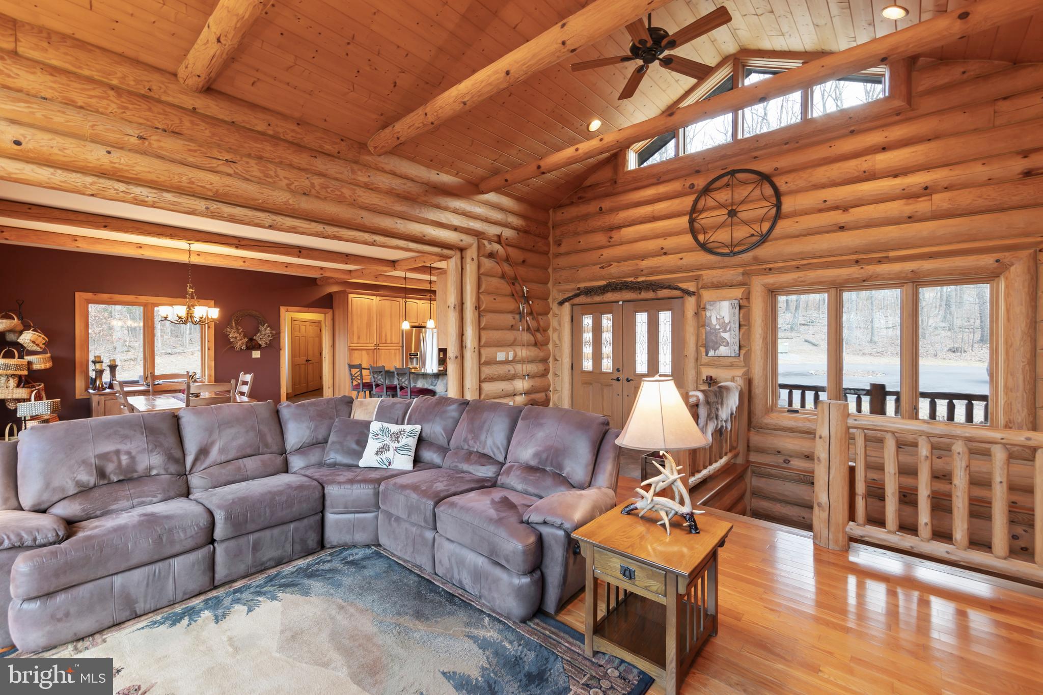 181 Signal Ridge Lane Winchester, VA 22603 - Photo 21 of 70 a living room with furniture a clock and a window