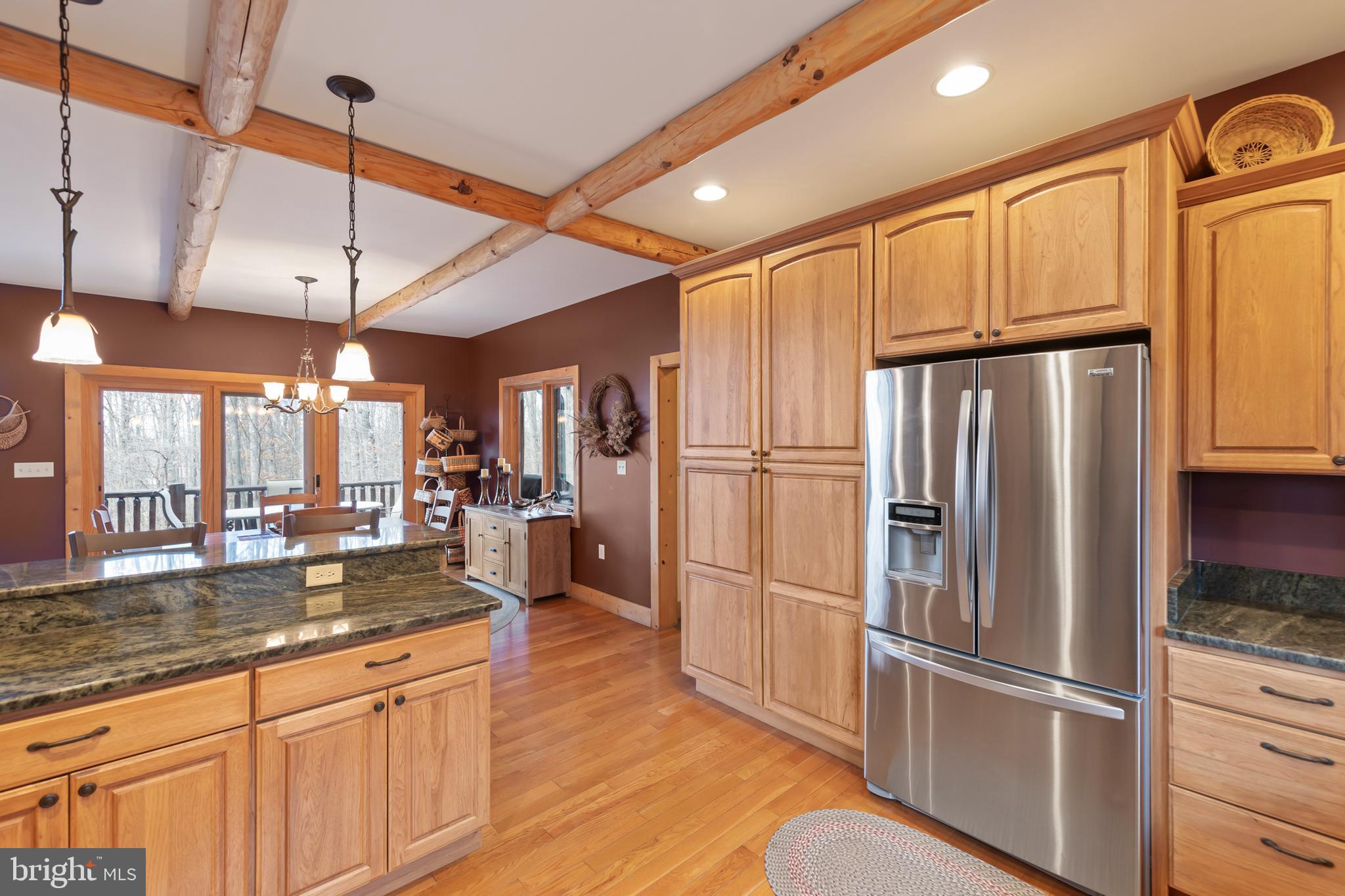 181 Signal Ridge Lane Winchester, VA 22603 - Photo 27 of 70 a kitchen with refrigerator a sink and cabinets